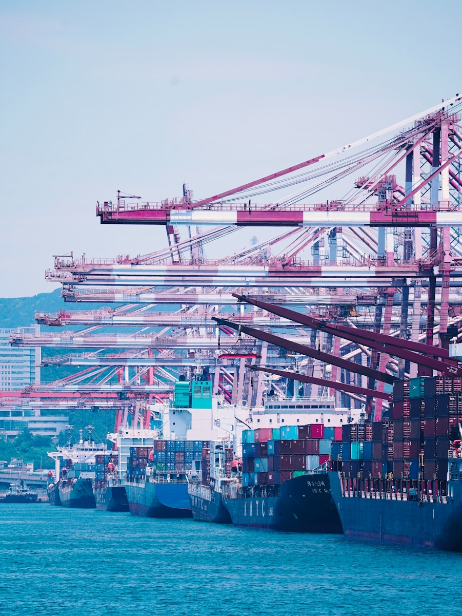 a group of boats that are sitting in the water